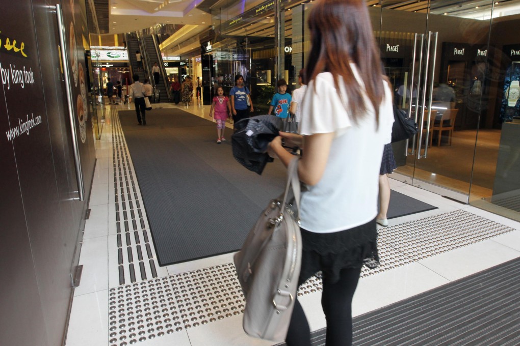 The One in Tsim Sha Tsui features tactile paths to guide the blind, but its main entrance has no automatic door. Photo: Edward Wong
