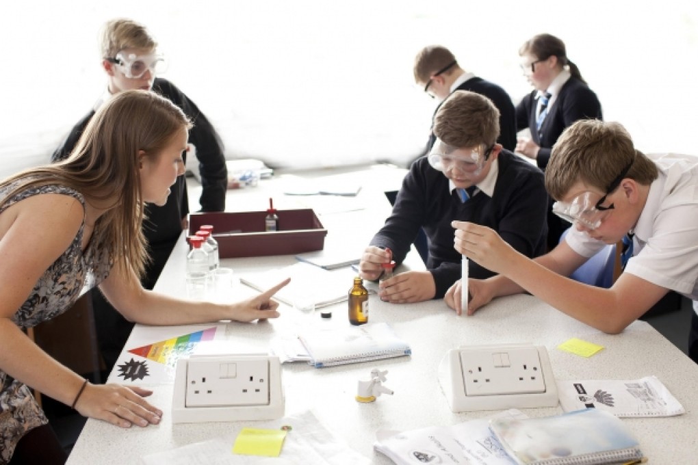 Lauren Neilson teaches her biology students at Bishopbriggs Academy. Photo: NYT