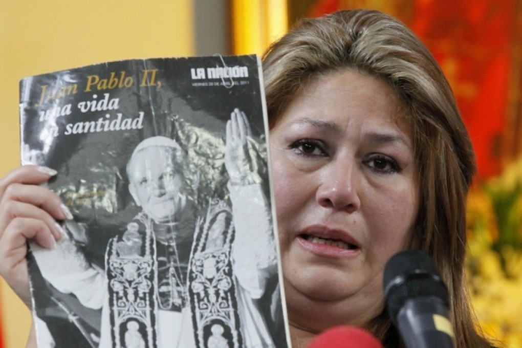 Floribeth Mora gives an account of her papal miracle. Photo: AP