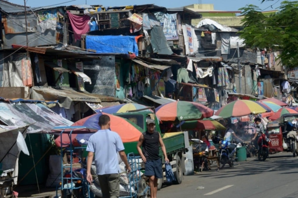 Houses in a shatty town in Manila. Photo: AFP