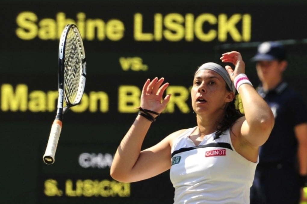Marion Bartoli celebrates beating Sabine Lisicki in their women's singles final match at Wimbledon yesterday. Photo: AFP