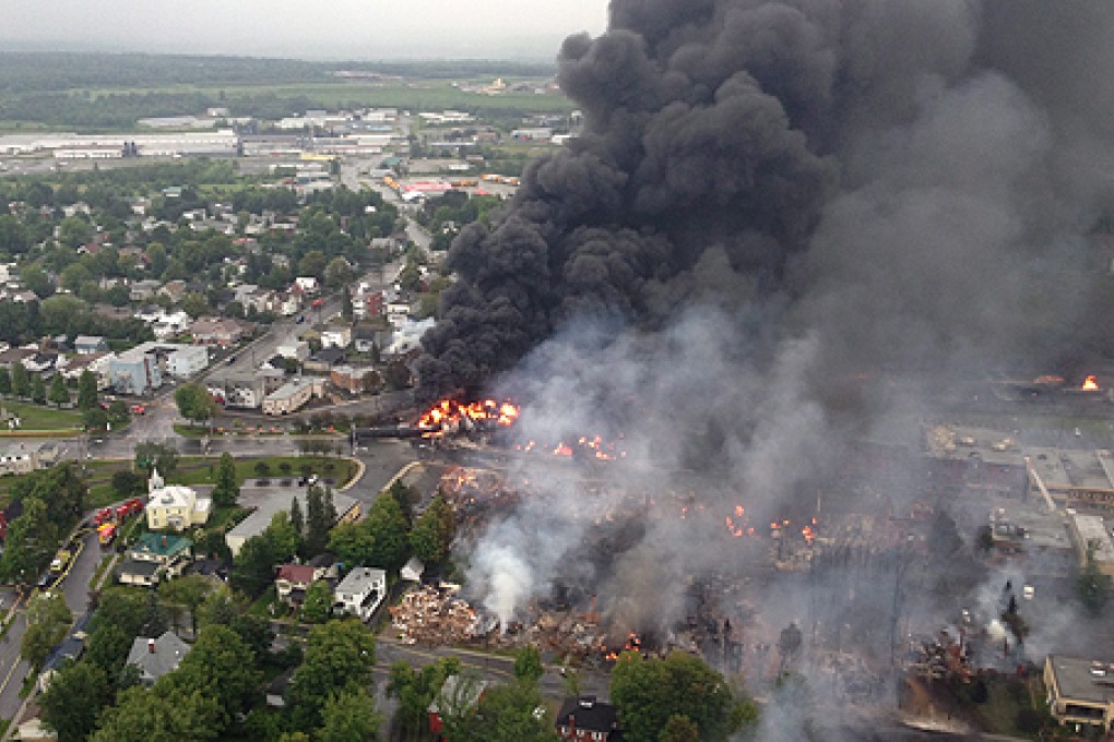 Fire spreads in the town of Lac-Megantic after a train derailment. Photo: AP