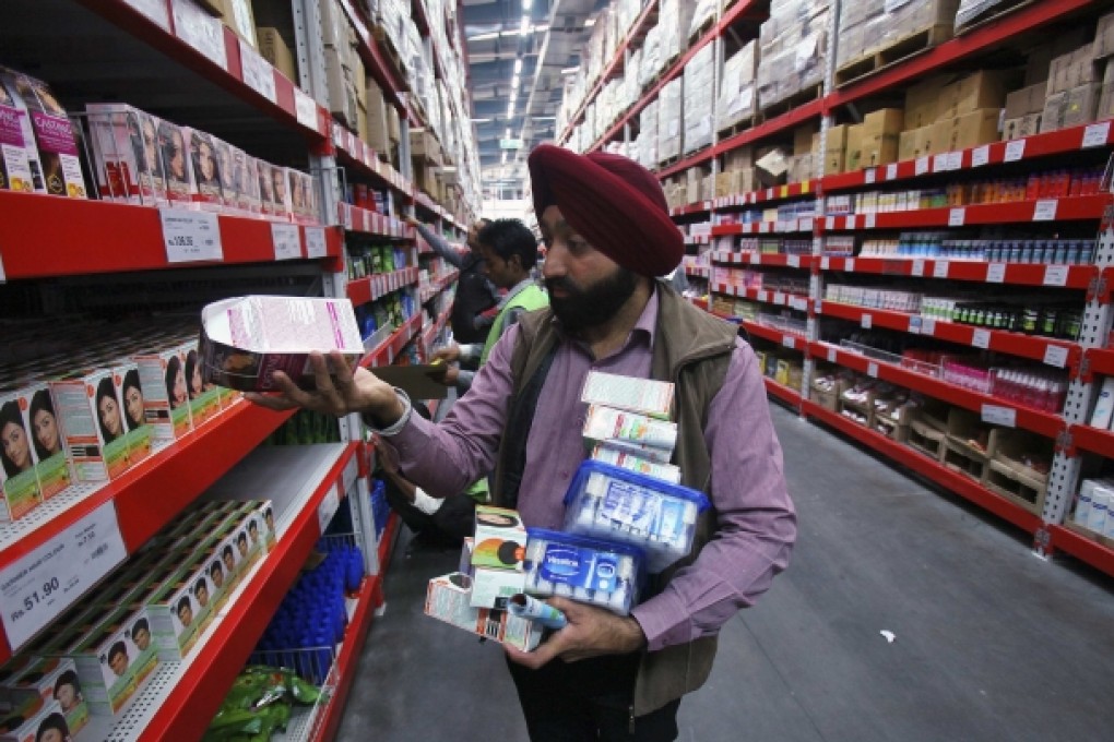 A customer shops at a Best Price Modern Wholesale store, a joint venture of Wal-MartStores and Bharti Enterprises. Photo: Reuters