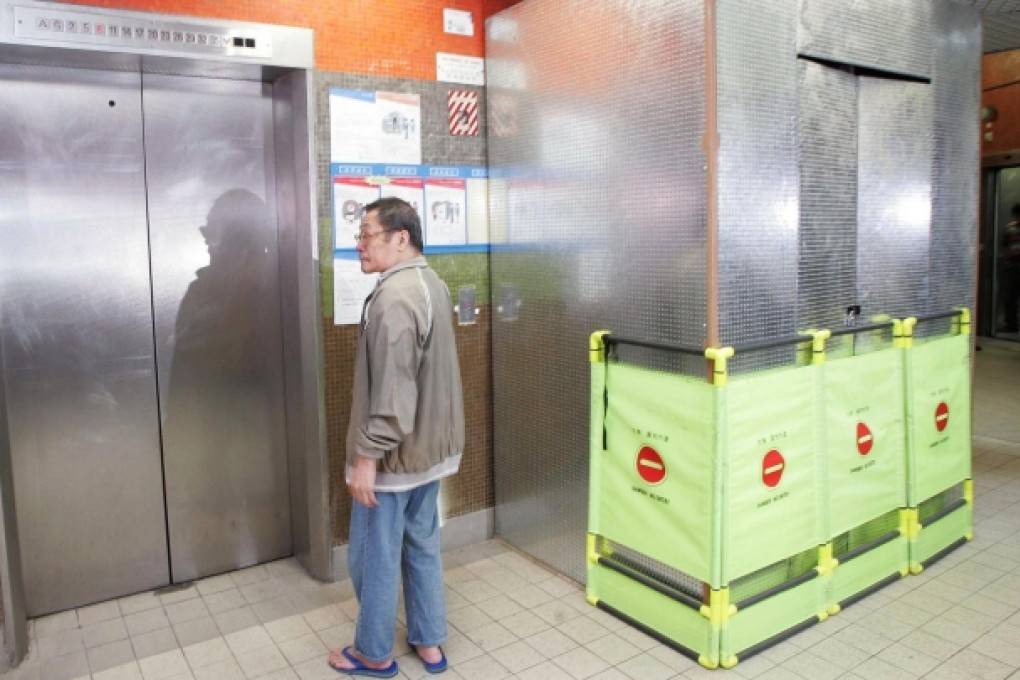Permits in lifts have a new look. Photo: SCMP