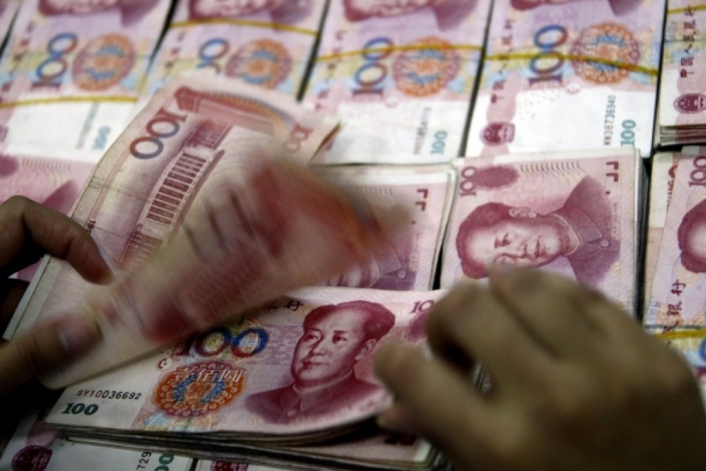 HSBC expects the yuan will be fully convertible within five years, with the currency's share of local deposits rising steadily. Photo: AFP