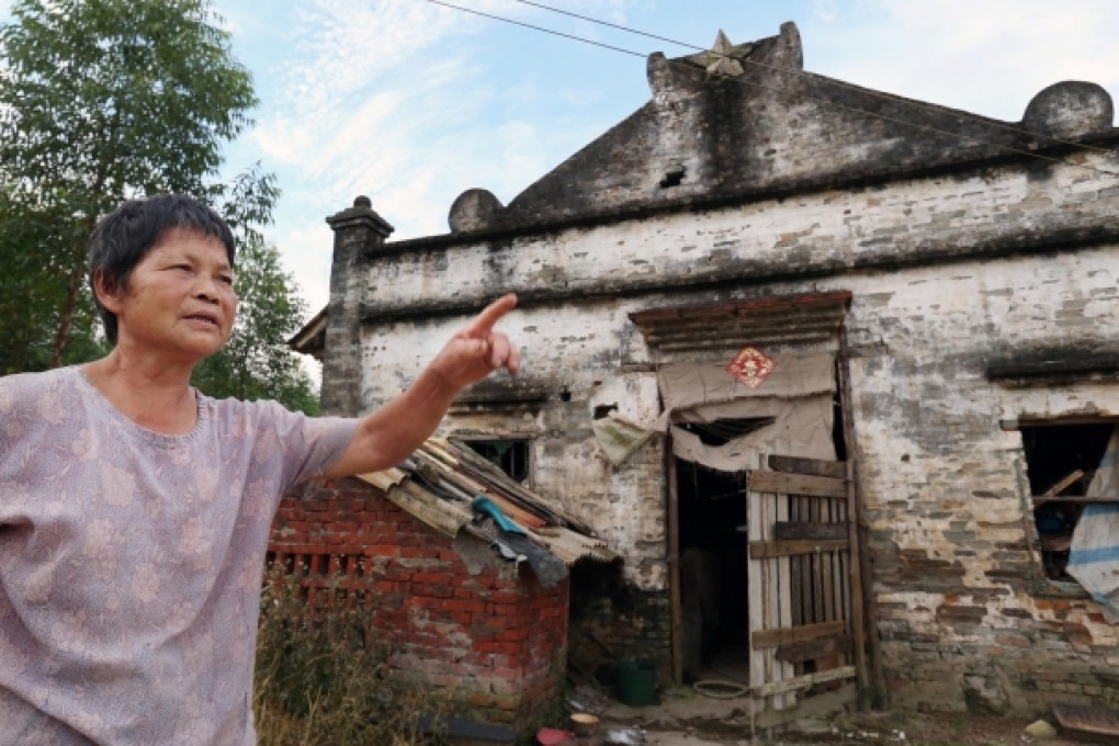 Nie Jiao, 70, and her husband will give up their pig farm fish pool if the plant is built on the site. Photo: Dickson Lee