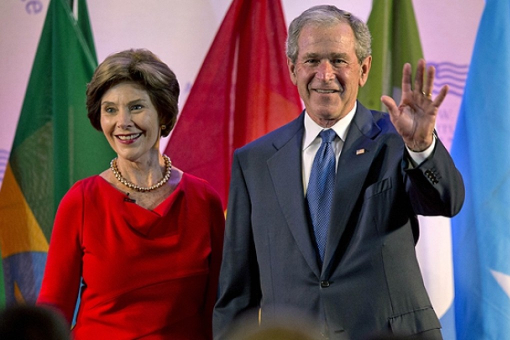 Former US President George W. Bush with wife Laura. Photo: AP