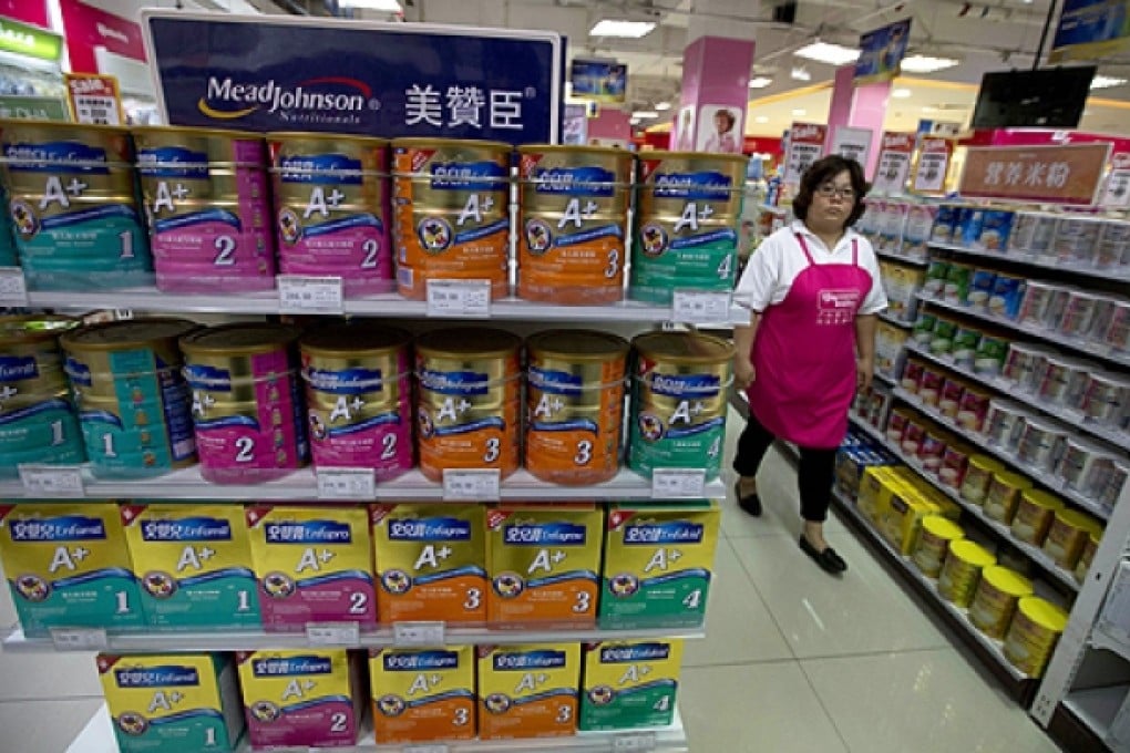 More companies have cut baby formula prices in China in response to the opening of a probe by Chinese authorities into alleged price-fixing by several foreign companies. Photo: AP