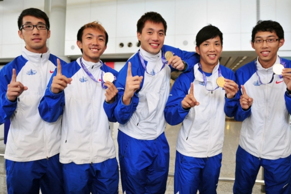Asian 4x100 metre relay champions Ho Man-lok, Tsui Chi-ho, Ng Ka-fung, Lai Chun-ho and Tang Yik-chun. Photo: SCMP