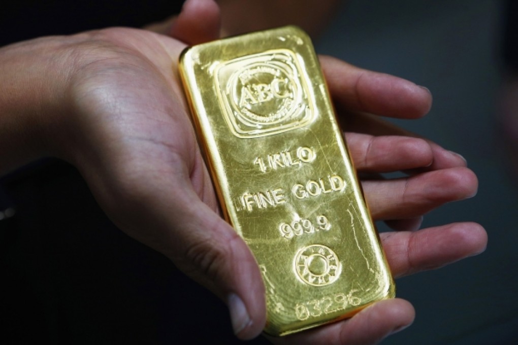Tumbling gold prices are believed to have taken the shine off John Paulson’s gold fund. Photo: Reuters