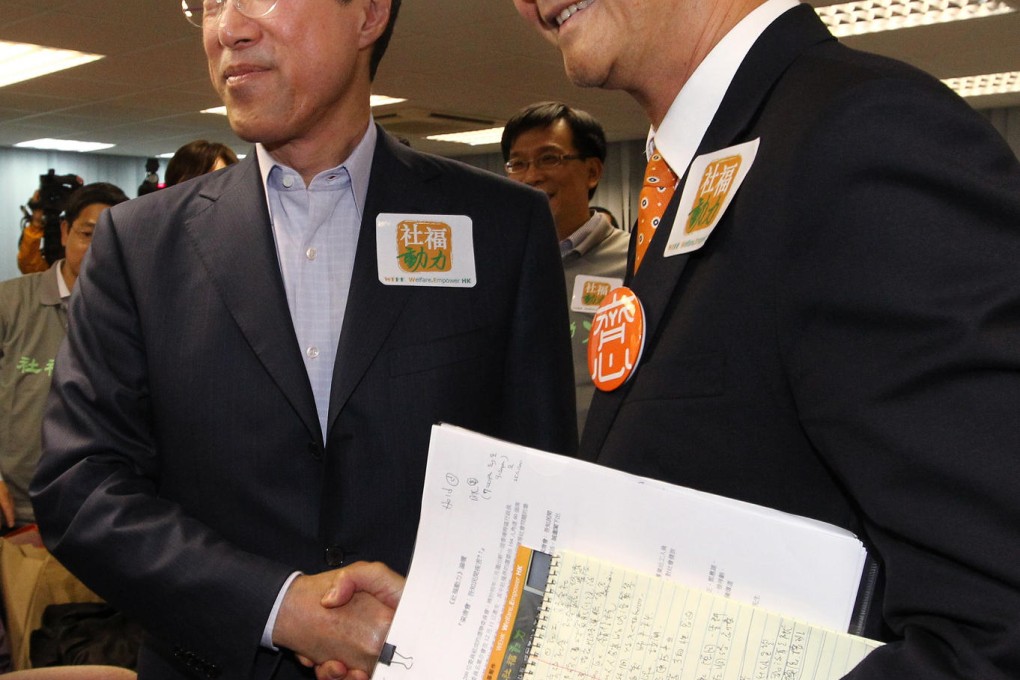 One-time rivals Henry Tang and C.Y. Leung. Photo: May Tse