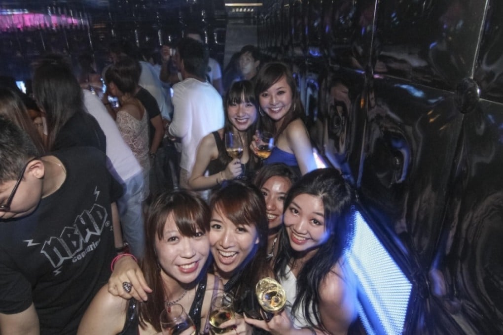Party-goers at the Beijing Club, which, at 12,000 sq ft and on three floors, is the biggest club in the city. Photo: Beijing Club