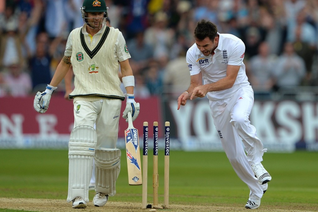 England's James Anderson (R) celebrates after bowling Australia's Michael Clarke (L) during the first Ashes cricket test match between England and Australia at Trent Bridge in Nottingham, central England. Photo: AFP