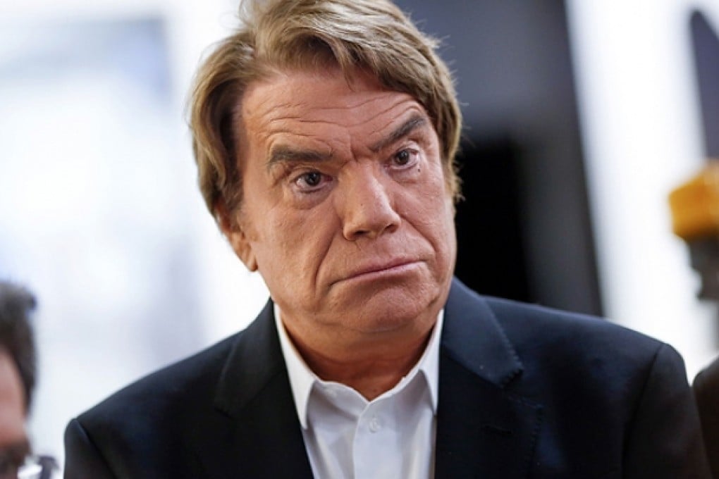 Tycoon Bernard Tapie attends a broadcasted debate on French news channel iTele. Photo: AFP
