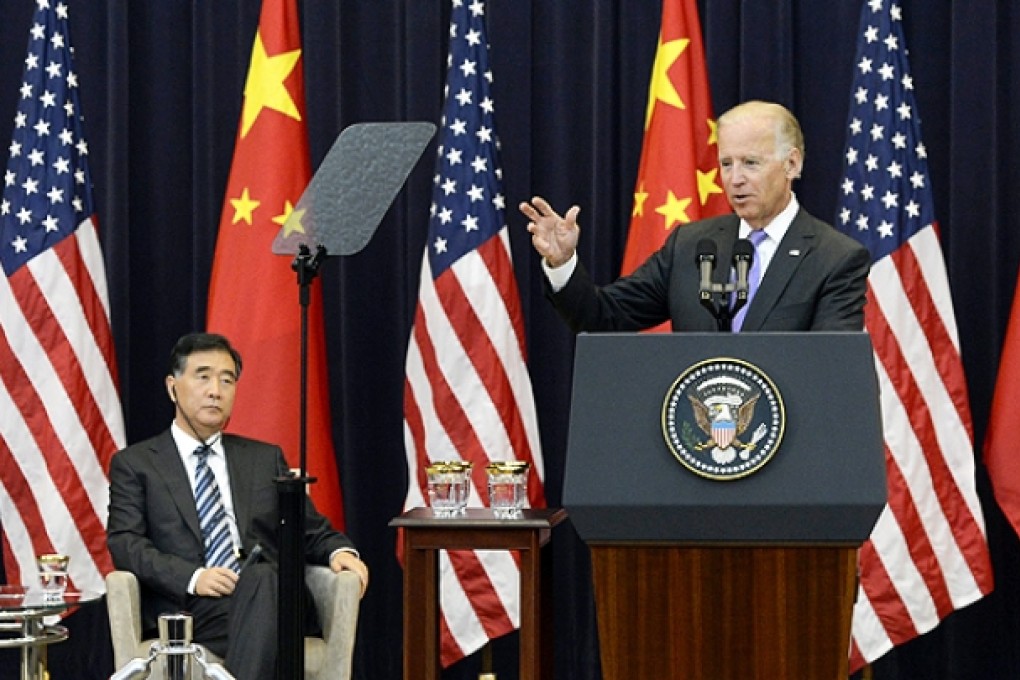 Vice Premier of China Wang Yang listens to US Vice President Joe Biden at the opening of the US-China strategic and economic dialogue meeting in Washington. Photo: EPA