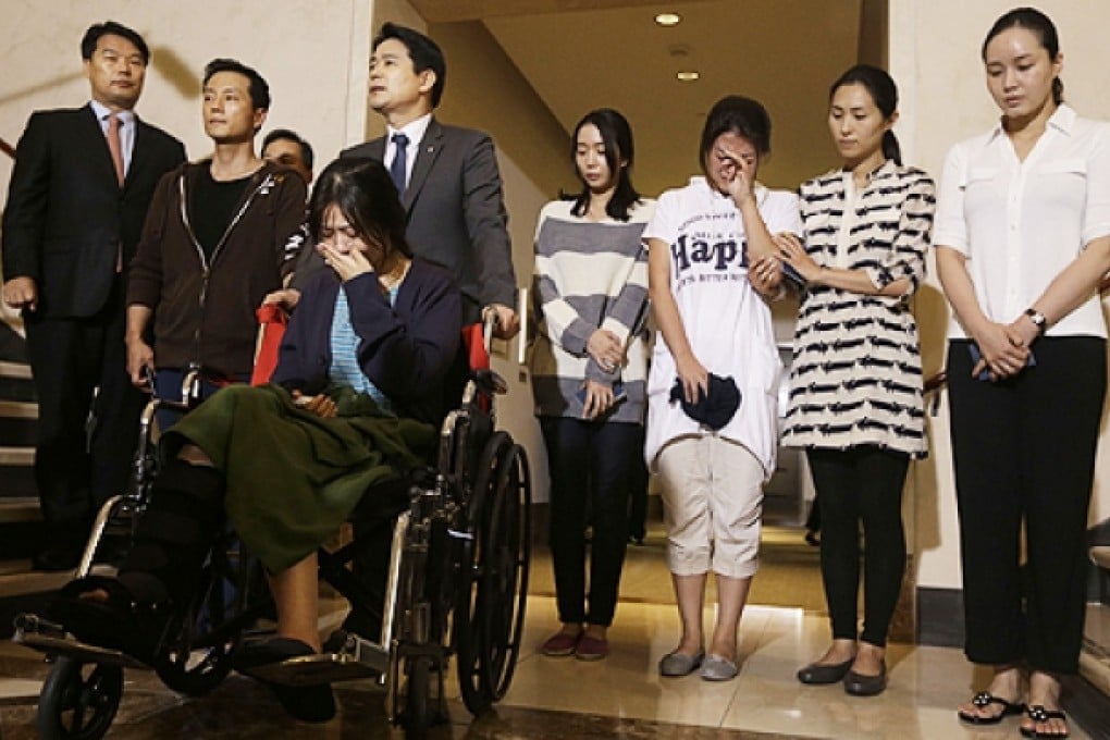 Flight crew members from Asiana flight 214 appear at a news conference at San Francisco International Airport. Photo: AP