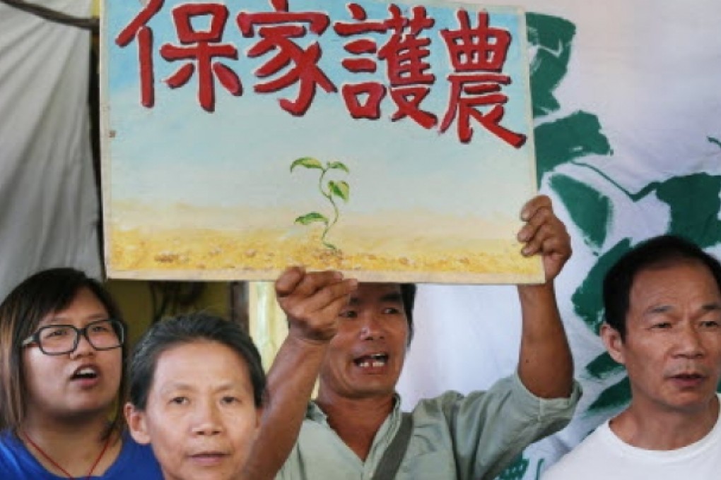 Angry residents protest against the new town project. Photo: Dickson Lee