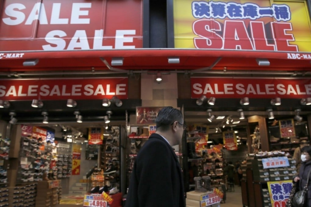 Japan’s central bank is sticking with its prediction that core consumer inflation will accelerate to close to 2 per cent in the business year to March 2016. Photo: Reuters