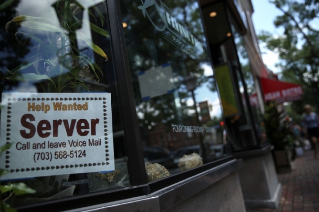 US employment in June showed a robust gain of 195,000 jobs, although the jobless rate was steady at 7.6 per cent. Photo: AFP