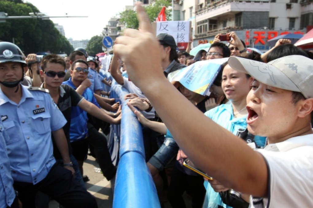Jiangmen residents voice their opposition to the proposed nuclear fuel plant yesterday at one of two rallies. Photo: Dickson Lee