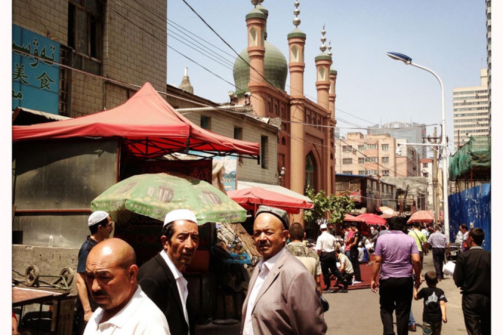 Uygur people attend Friday prayer at the Baitulla Mosque in Urumqi. Photo: Simon Wong