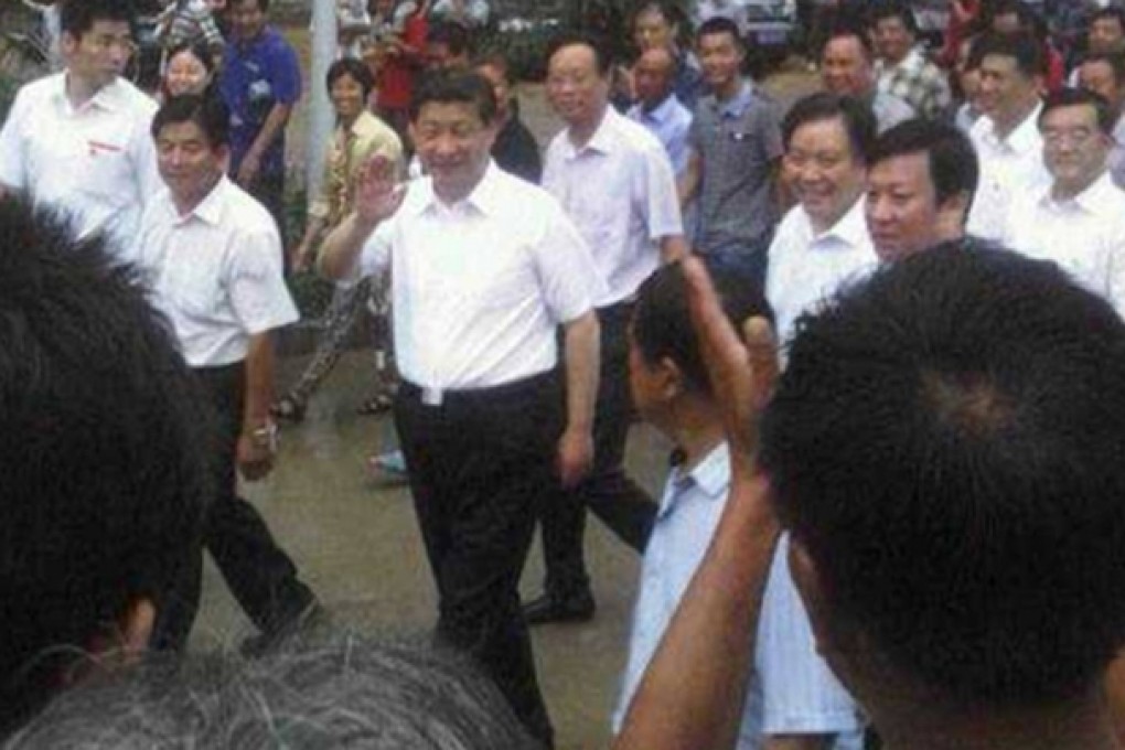 President Xi Jinping greets locals in Zhengding county, Hebei.