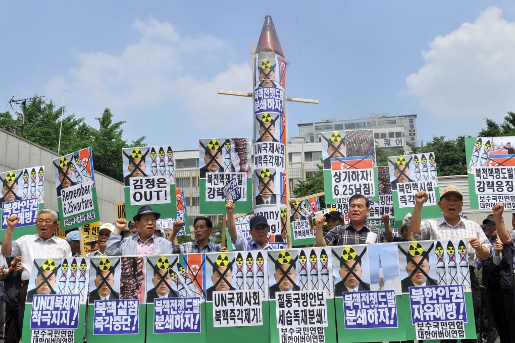 South Korean conservative activists during a recent rally against North Korea's nuclear programme. North Korea has mobilised a variety of missiles in preparation for a massive military parade later this month. Photo: AP