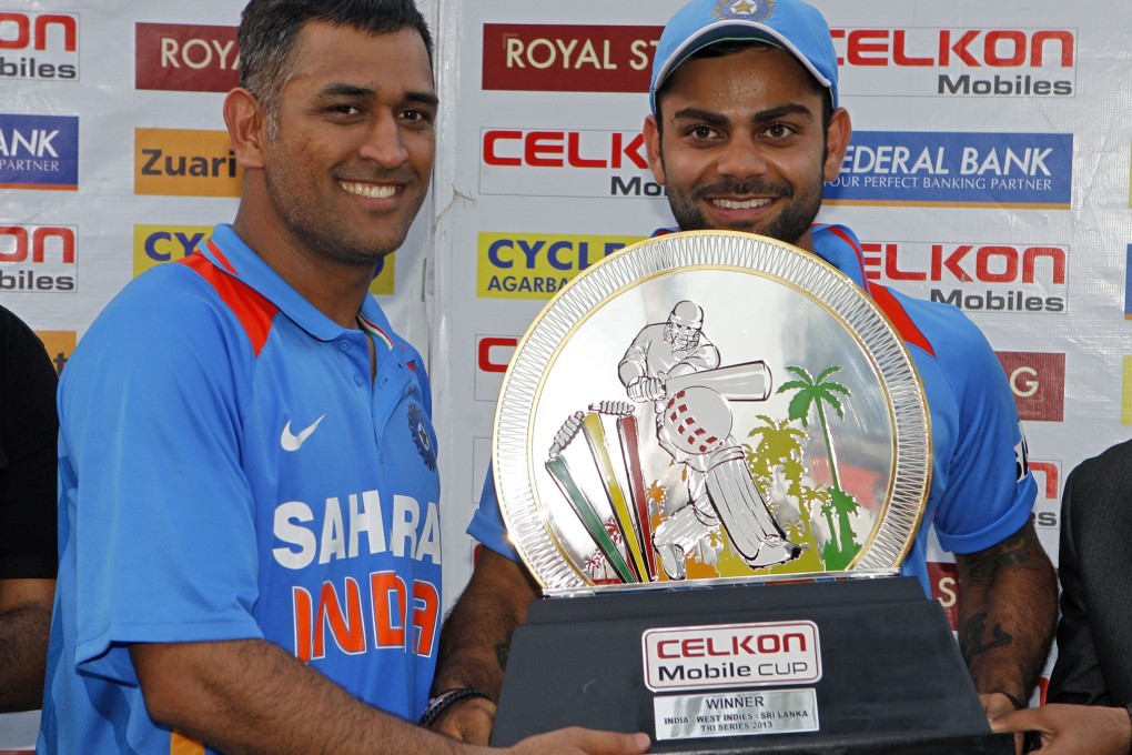 India's captain Mahendra Singh Dhoni (left) and teammate Virat Kohli. Photo: AP