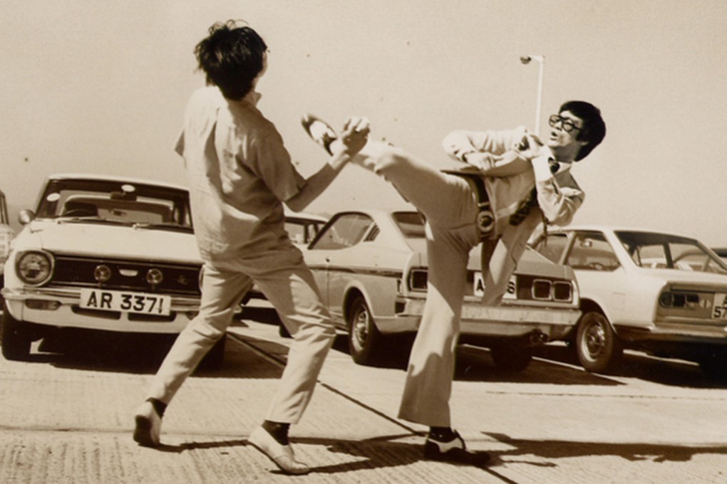 Bruce Lee poses for cameras at Ocean Terminal. Photo: SCMP