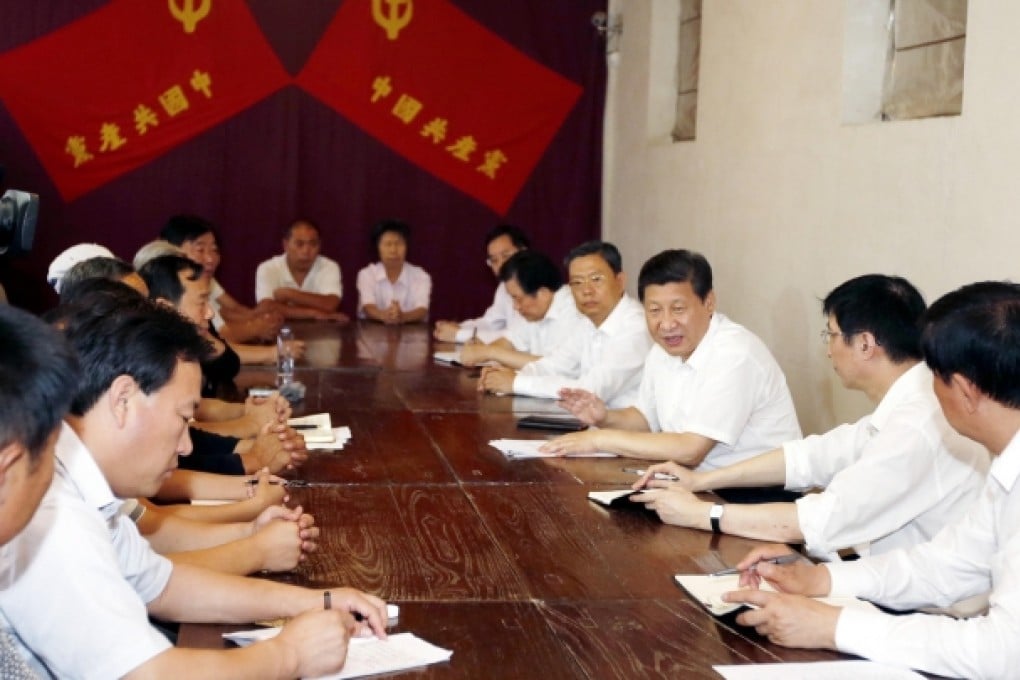 Xi Jinping (third from right) meets cadres and representatives of the public at Xibaipo. Photo: Xinhua