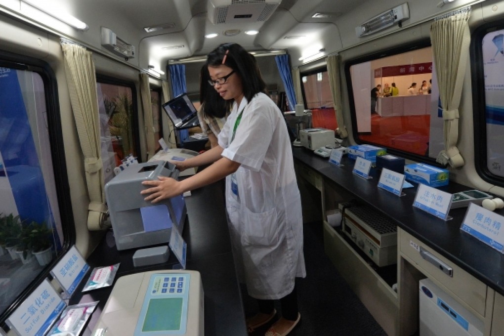A mobile food testing vehicle shown at the China International Food Safety Technology & Innovations Expo, which will be used by Walmart to test food from their suppliers. Photo: AFP