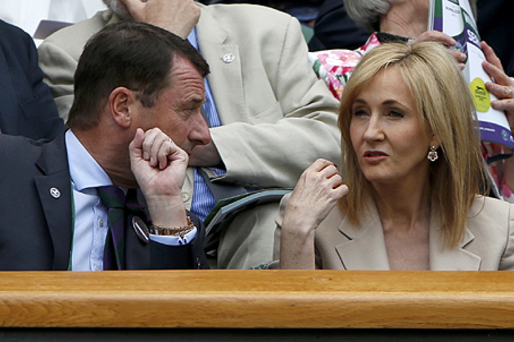 Author J K Rowling (right) attends Wimbledon in London on June 25. She wrote a crime novel under the name Robert Galbraith. Photo: Reuters
