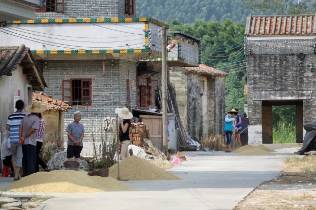 Villagers in Heshan's Lianzhu, the village that was planned to move out for giving way for the controversial uranium processing plant, said they are disappointed with the scrap decision. Photo: Dickson Lee