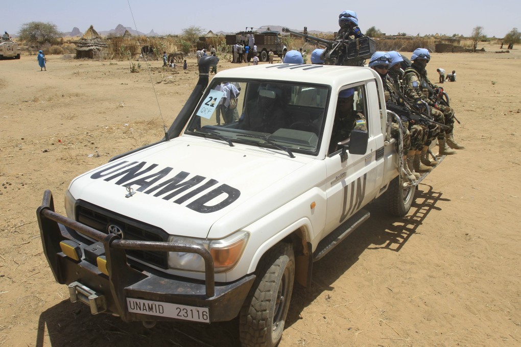 Peacekeepers with the United Nations-African Union Mission in Darfur (UNAMID) patrol the Shangli Tobaya area for displaced people in North Darfur state. Photo: AFP