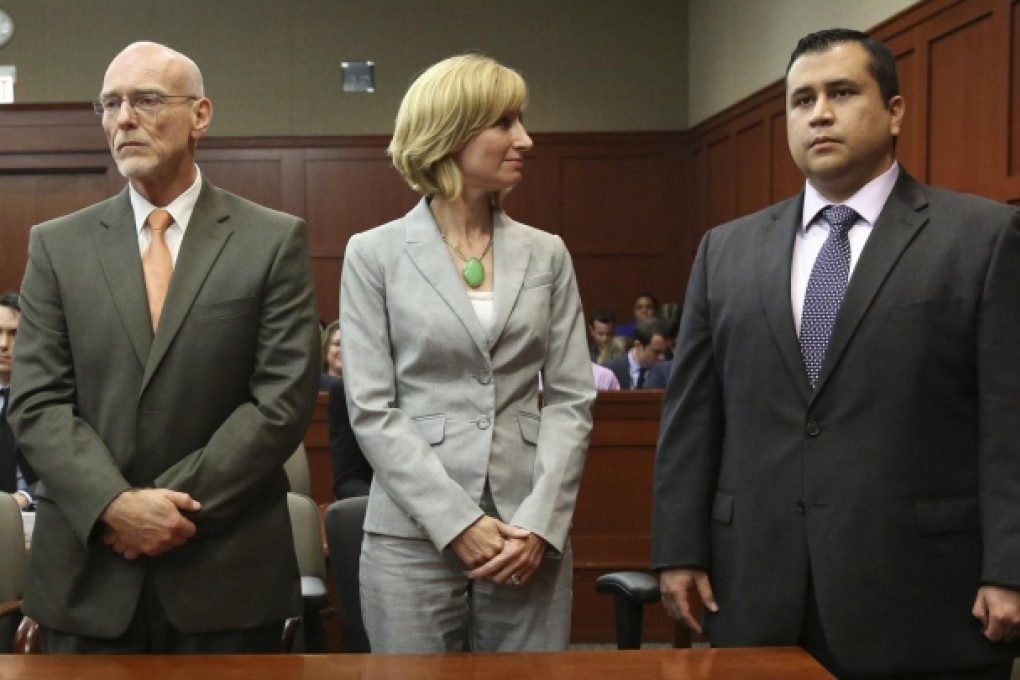 Defendant George Zimmerman listens impassively as the not-guilty verdict is delivered. Photo: Reuters