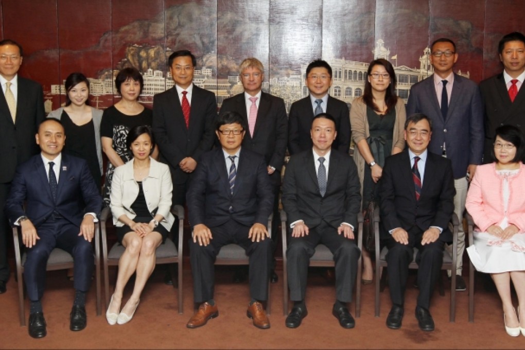 The judges (seated, from left), Peter Lee, CPA Australia; Shirley Yuen, Hong Kong General Chamber of Commerce; Robin Hu, CEO, SCMP Group; Ken Lee, DHL Express; Richard Wong, University of Hong Kong; Janice Choi, Chinese General Chamber of Commerce, Hong Kong. Standing (from left), Albert Chan, HSBC; Jacqueline Chong, Green Tomato; Wang Duo Duo, Phoenix Satellite Television; Wang Tianyi, China Everbright; Mark Whitehead, HK Air Cargo Terminals; Jacky Kwan, Bamboos Professional Nursing Services; Heddy Li, Ovolo; Wang Xiangwei, editor-in-chief, SCMP; Paul Wu, Junior Chamber International HK.
