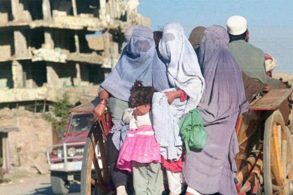 The Taliban Islamic movement has implemented a tough dress code on women, requiring the face and body to be completely covered with the Islamic higab, or veil. Photo: AP