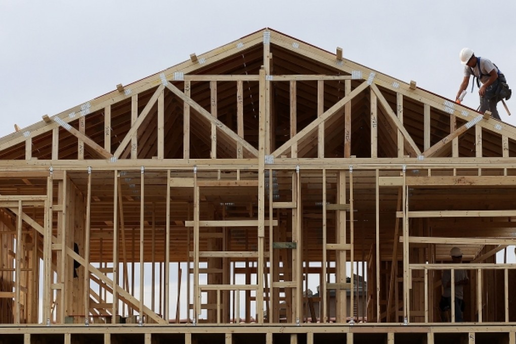 Both Wells Fargo and JPMorgan have warned that mortgage lending volumes will fall in coming months as higher mortgage rates crimp sales. Photo: AFP