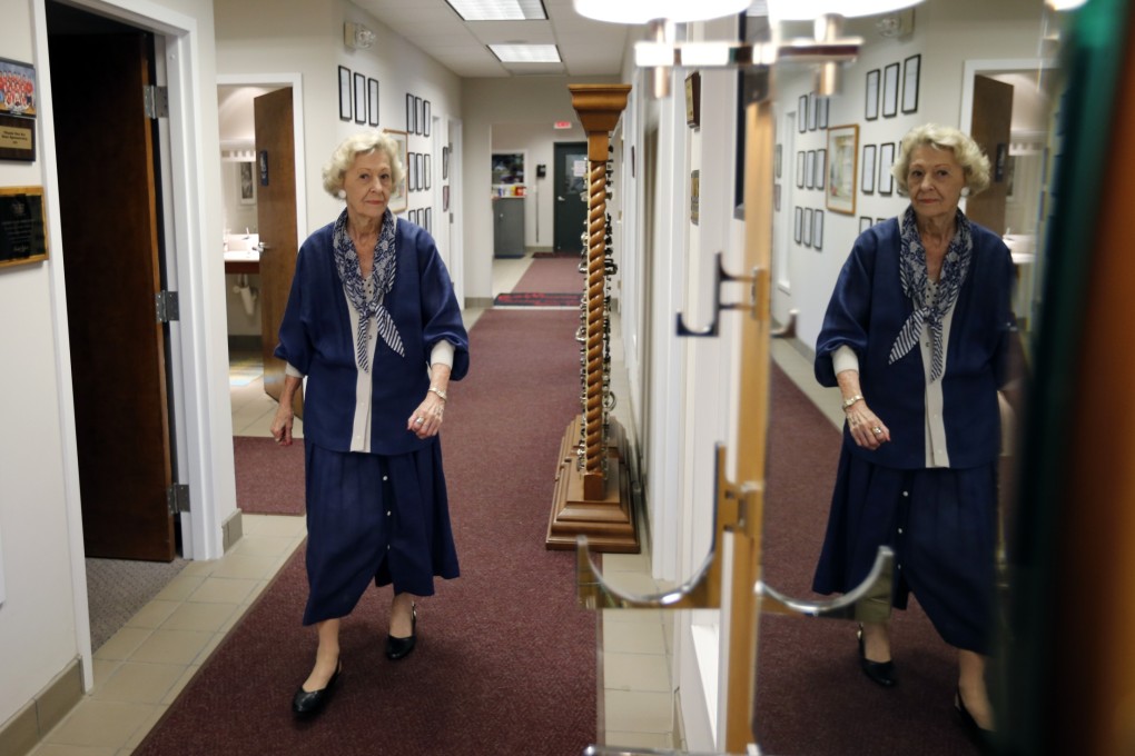 American woman June Springer, 90, still works as a receptionist. People who delay retirement have less risk of developing Alzheimer's disease , a study of half a million people in France found. Photo: AP