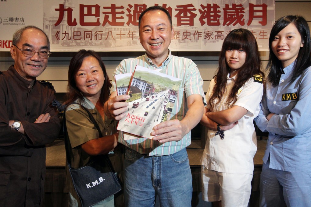 Tim Ko (centre), shows his work at the Book Fair. Photo: May Tse