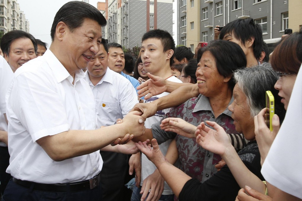 President Xi Jinping meets residents of Tayuanzhuang village during an inspection tour last week in Zhengding county, in the northern province of Hebei. Photo: Xinhua