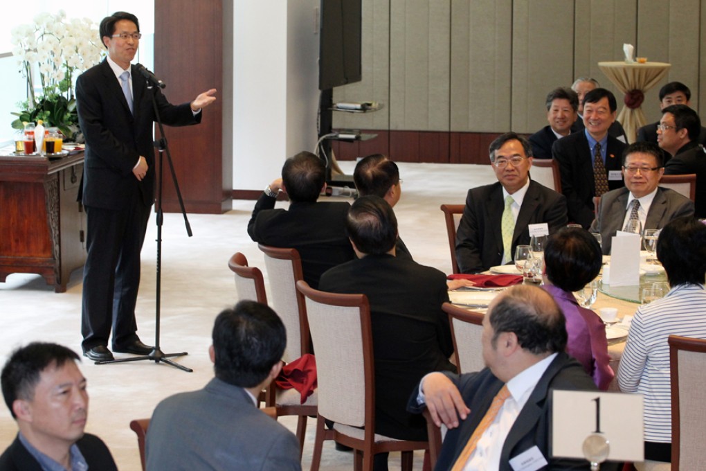 Liaison office director Zhang Xiaoming delivers a speech during the lunch. Photo: Felix Wong