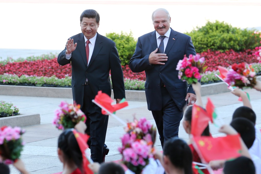 Chinese President Xi Jinping and Belarusian President Alexander Lukashenko seen at a welcoming ceremony in Beijing on Tuesday. Photo: Xinhua