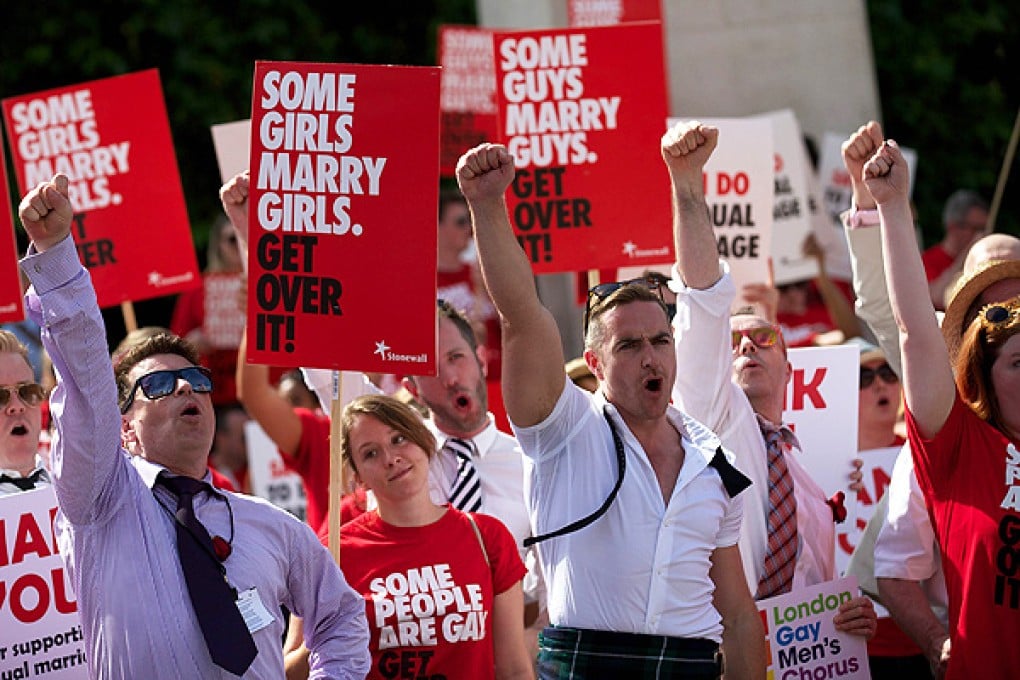 Gay campaigners rally outside the Houses of Parliament in London. Photo: AFP