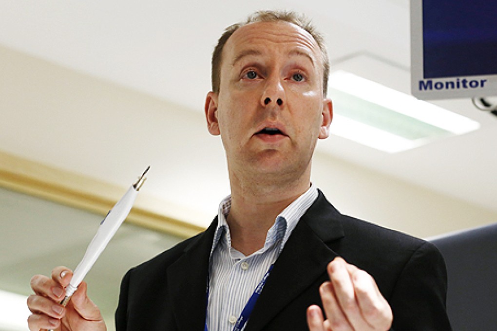 Inventor of the 'intelligent' knife, Zoltan Takats, speaks to the media at St Mary's Hospital in London on Wednesday. Photo: Reuters