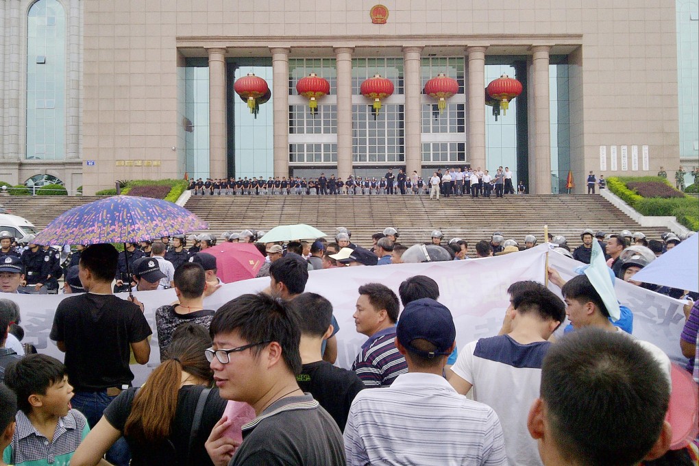 Protesters outside the government headquarters. Photo: Mimi Lau