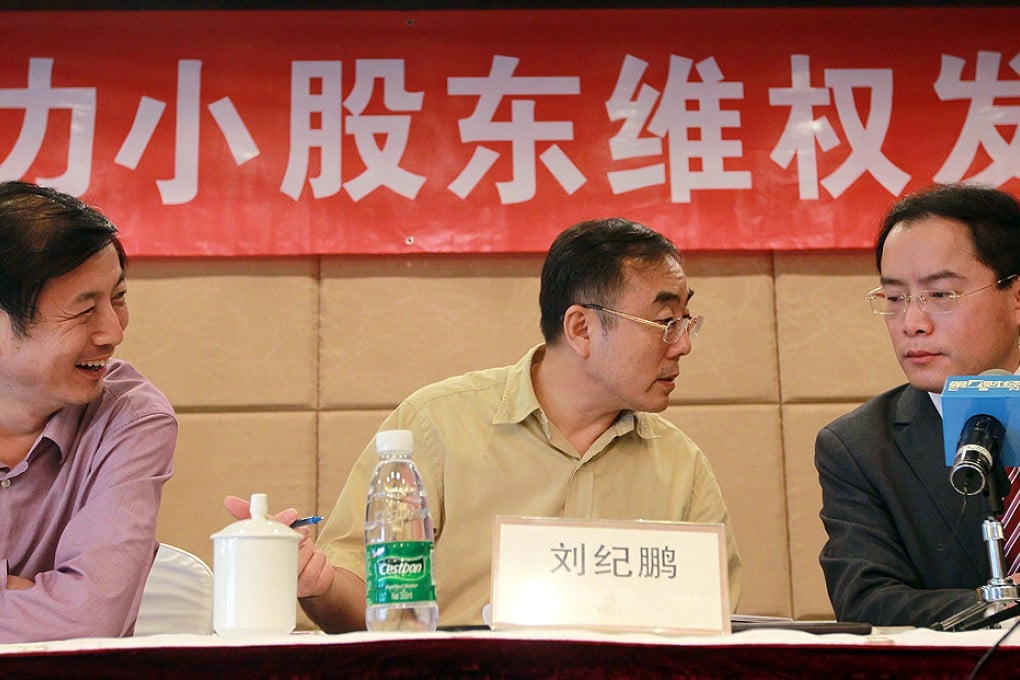 The interests of minority shareholders are discussed in Beijing yesterday by Li Su of Hejun Vanguard (left), Liu Jipeng of China University of Political Science and Law, and lawyer Chen Ruojian. Li urged Hong Kong’s securities regulator to launch a probe. Photo: Simon Song