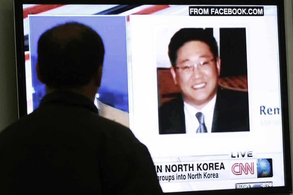 A South Korean watches a television programme on the plight of jailed Korean American Kenneth Bae in May. Photo: AP