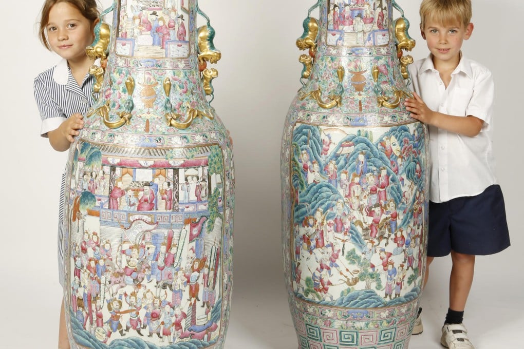 The vases tower over Isabella Schwinge, eight, and her brother Oliver, six. Photo: TengaiMedia