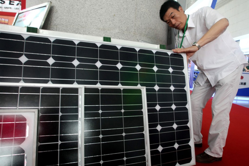 China's Ministry of Commerce said that it would impose provisional anti-dumping duties starting from 24 July 2013 on imported solar-grade polysilicon from the United States and Korea. Photo: EPA